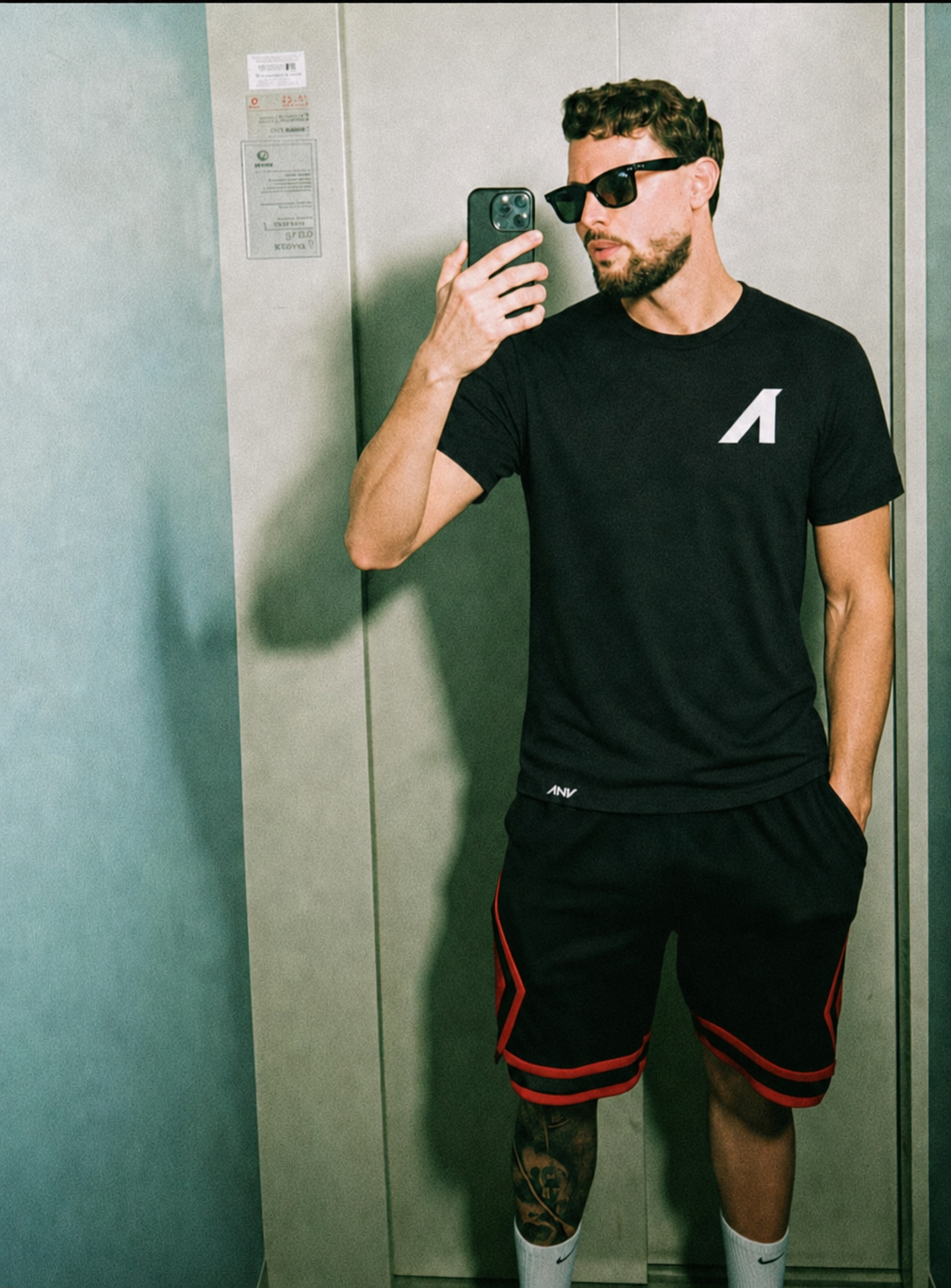 "A is for ANY" Unisex CVC Heather Short Sleeve Tee (Black)